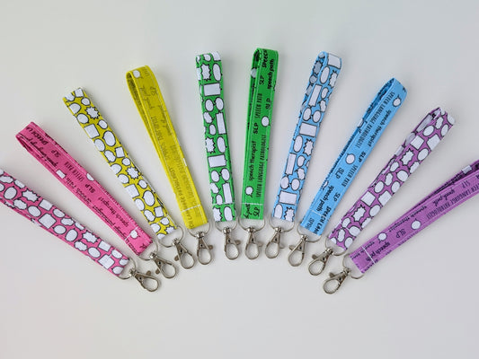 Set of colorful keychains on a white background
