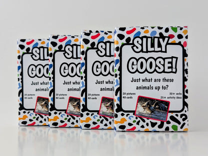 Four boxes of 'Silly Goose!' card game on a white background